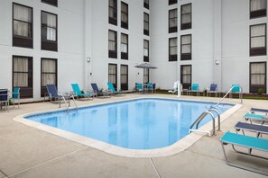 Seasonal outdoor pool, open 9:00 AM to 10:00 PM, sun loungers