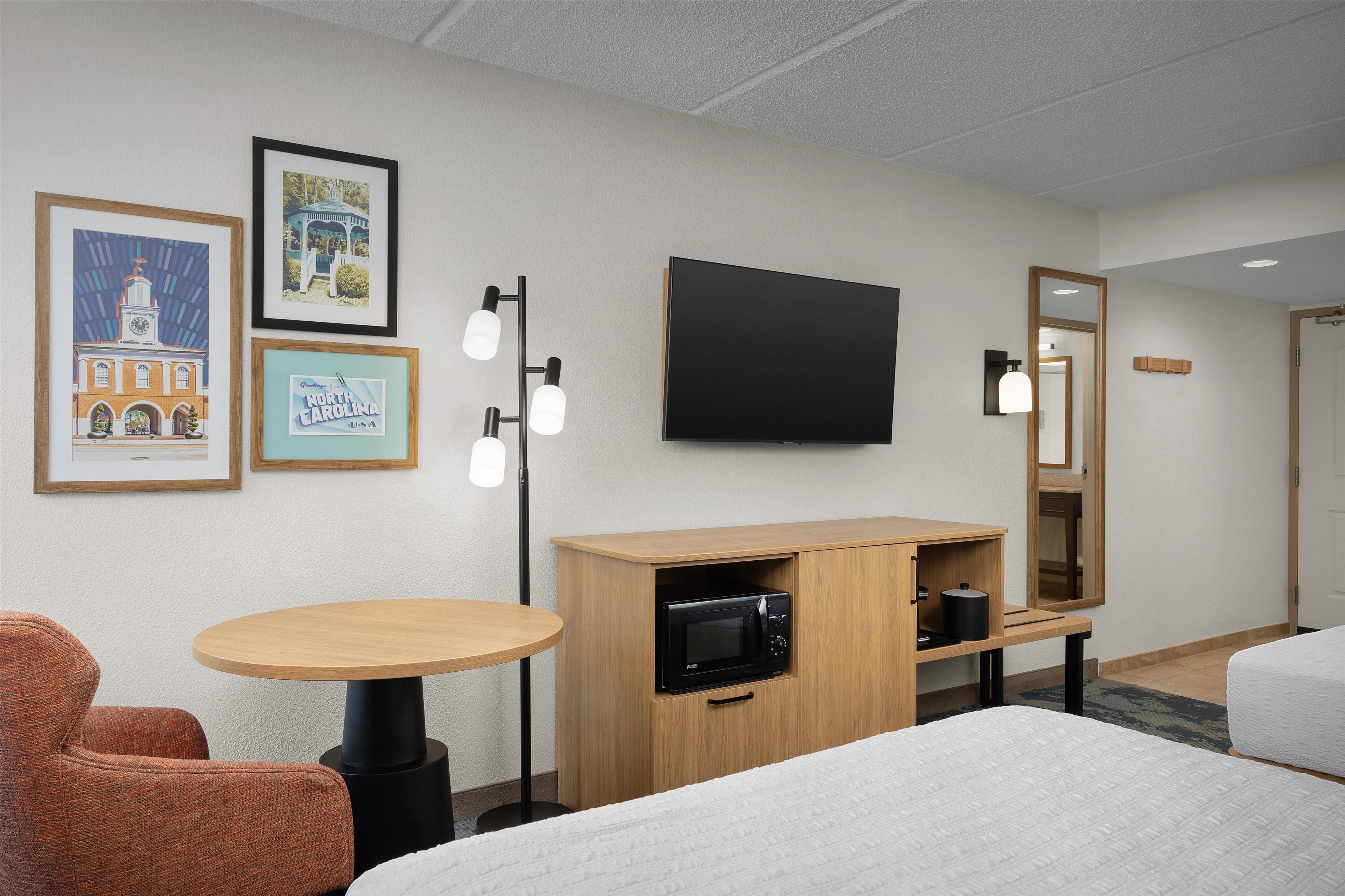 premium bedding, desk, laptop workspace, blackout curtains