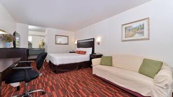 Desk, laptop workspace, blackout curtains, iron/ironing board