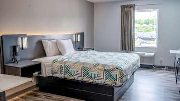 Tabla de planchar con plancha, wifi gratis y ropa de cama