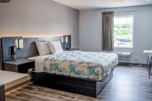 Tabla de planchar con plancha, wifi gratis, ropa de cama