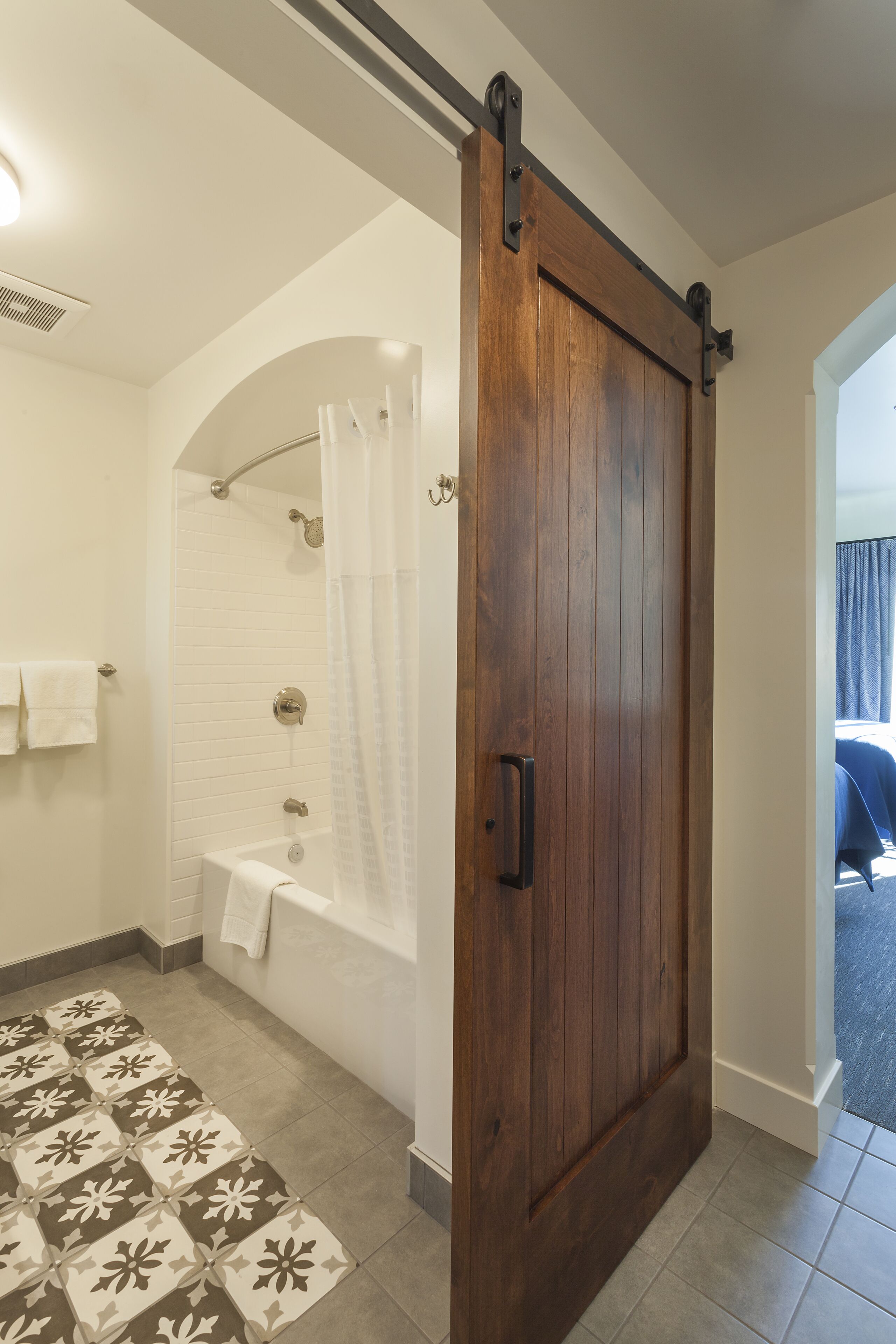 deluxe room, 2 double beds | bathroom | designer toiletries, towels