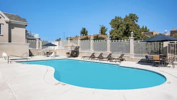 Outdoor pool, open 10:00 AM to 10:00 PM, sun loungers