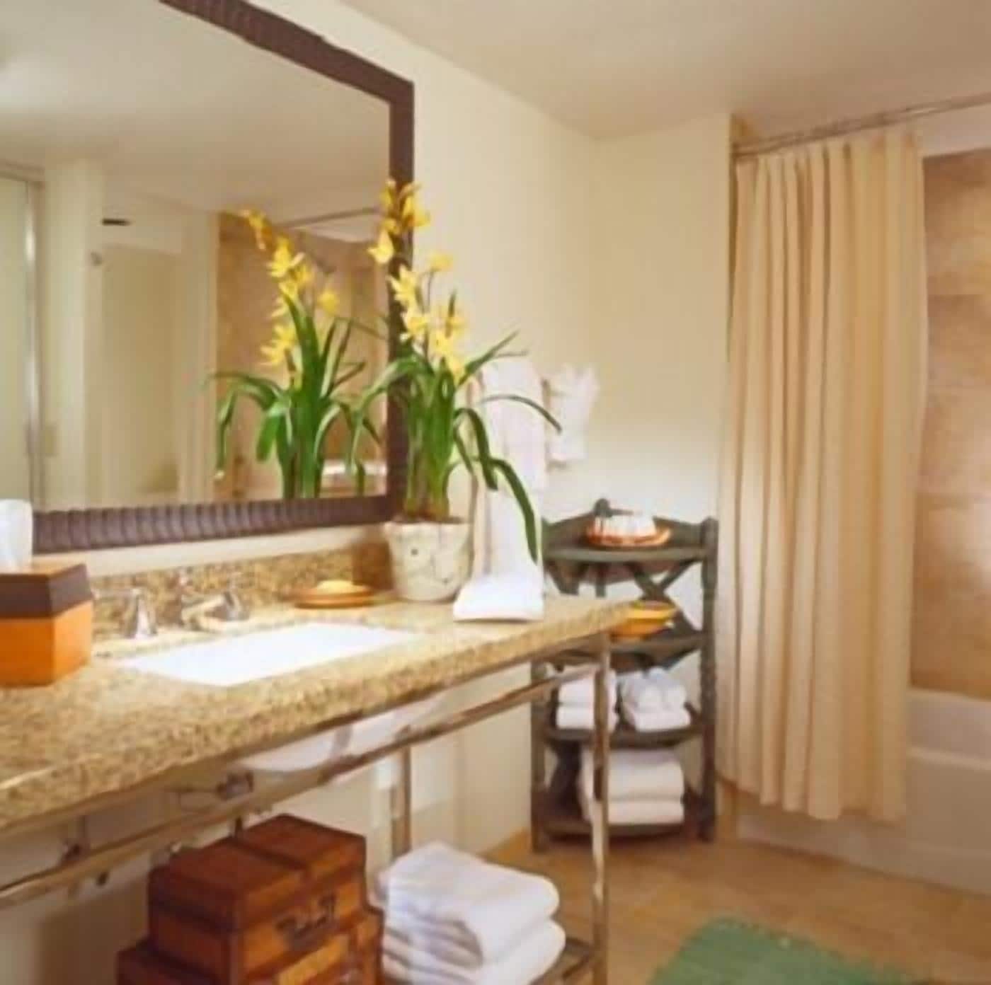 designer toiletries, hair dryer, towels