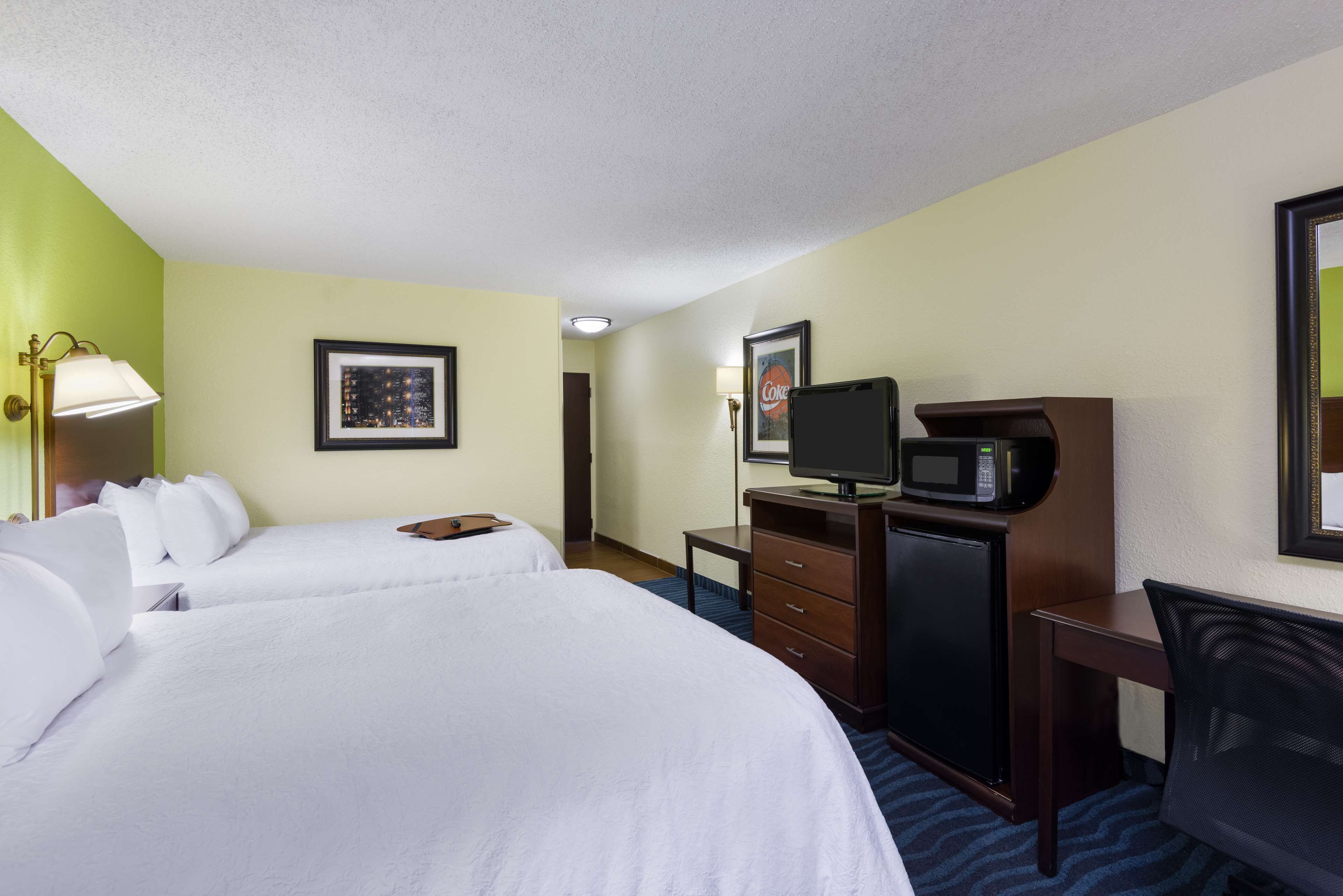 premium bedding, desk, laptop workspace, blackout curtains