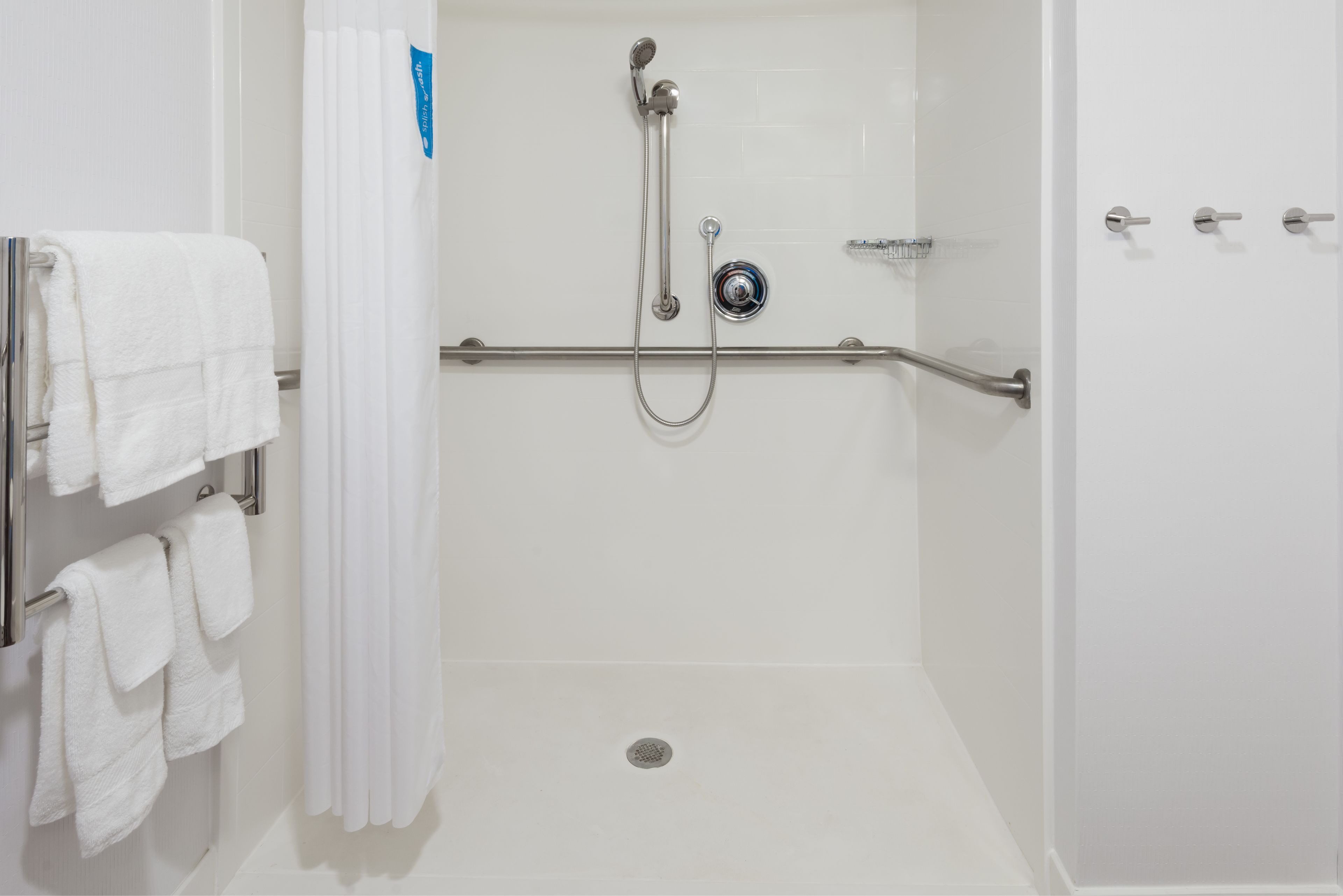 room, 1 king bed, accessible (roll-in shower) | bathroom | combined shower/bathtub, free toiletries, hair dryer, towels