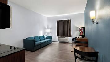 Studio, 1 King Bed, Non Smoking (2 Rooms) | Desk, blackout curtains, iron/ironing board, free WiFi