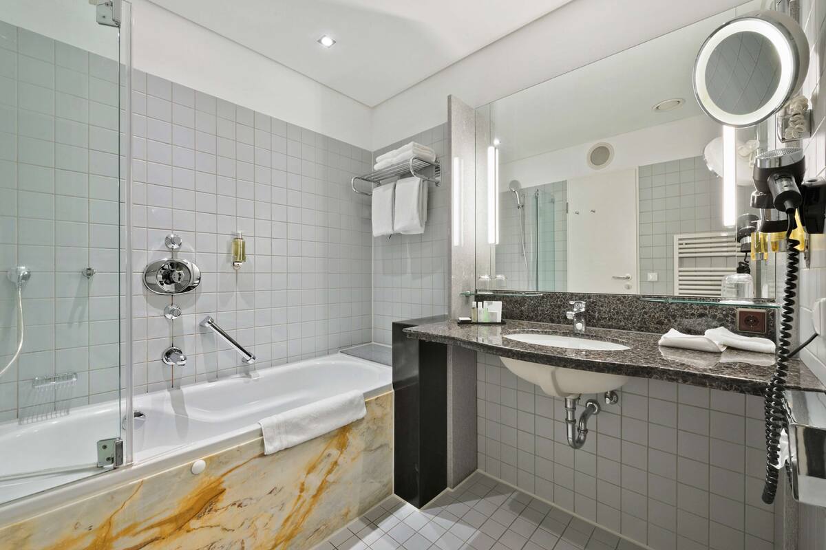 shower, designer toiletries, hair dryer, bathrobes