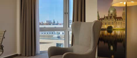 Premium bedding, down duvets, pillow-top beds, in-room safe