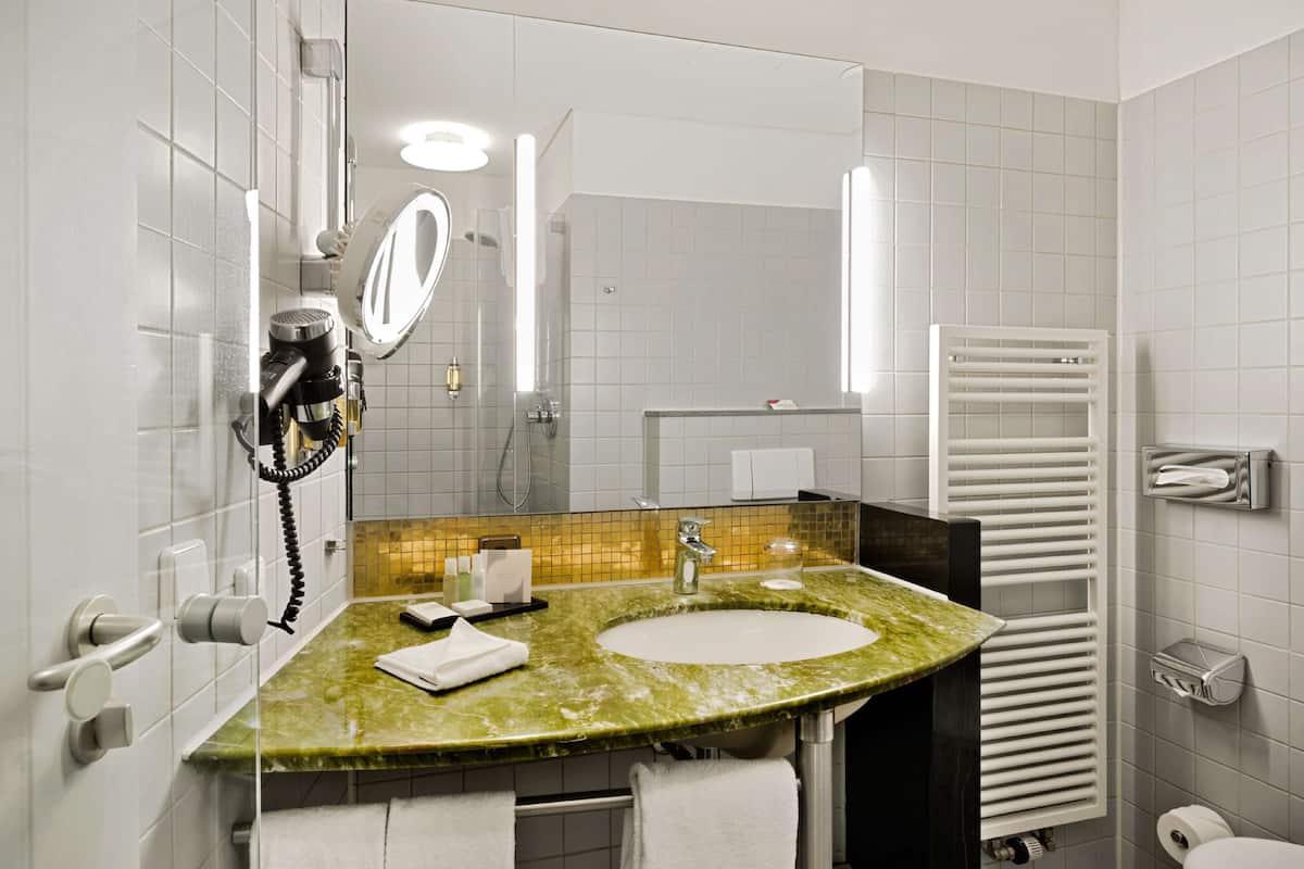 room, 1 queen bed, balcony | bathroom | shower, designer toiletries, hair dryer, bathrobes