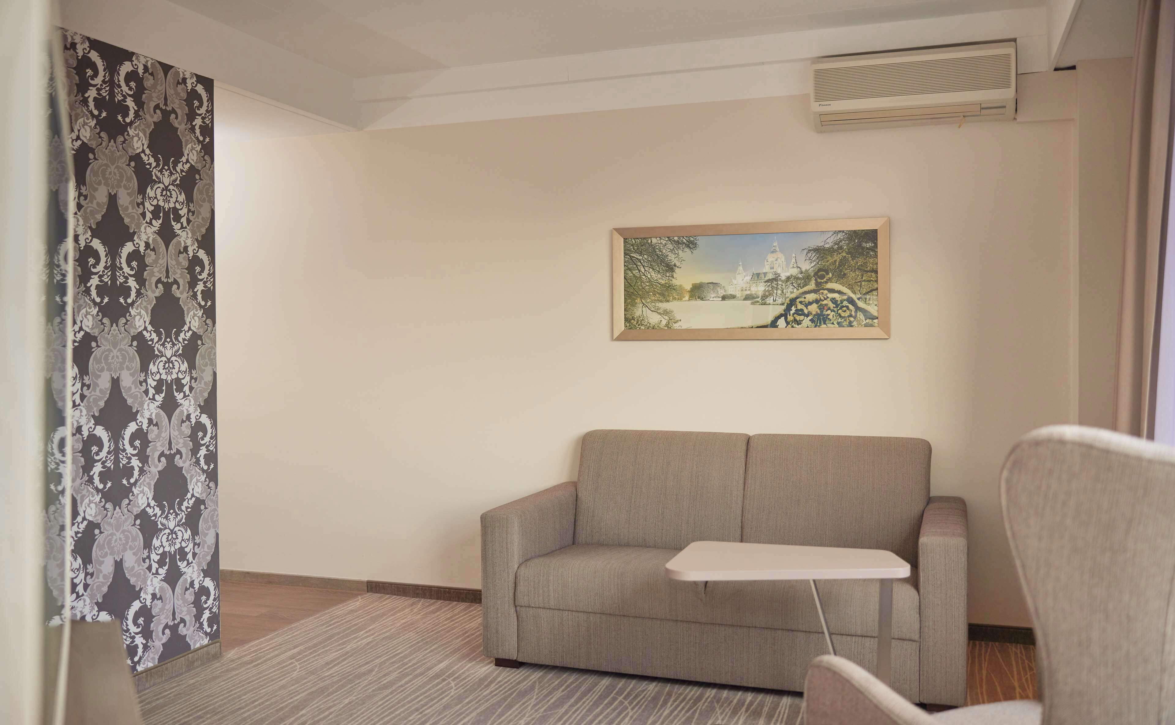 junior suite, 1 king bed, balcony | living area | 32-inch flat-screen tv with satellite channels, tv