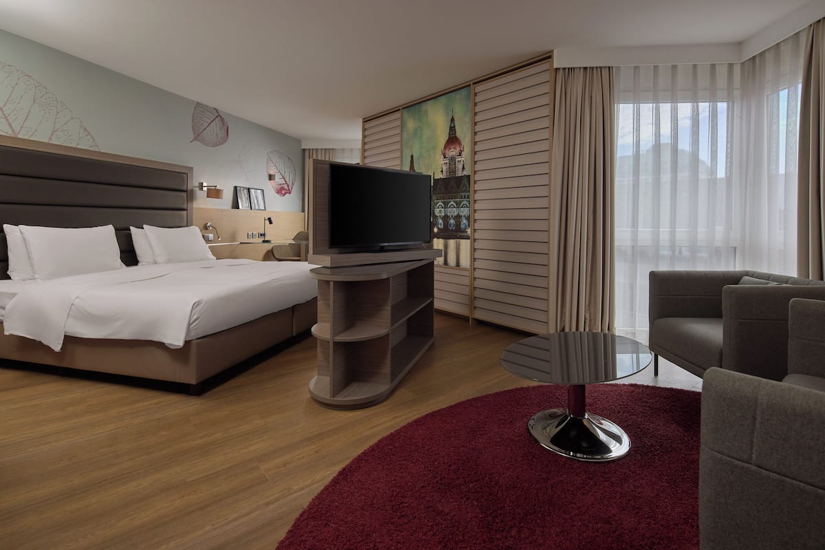 Suite junior, 1 cama King size | Ropa de cama de alta calidad, edredón y camas con pillow-top
