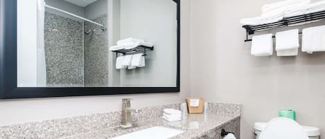 Combined shower/tub, towels, soap, toilet paper