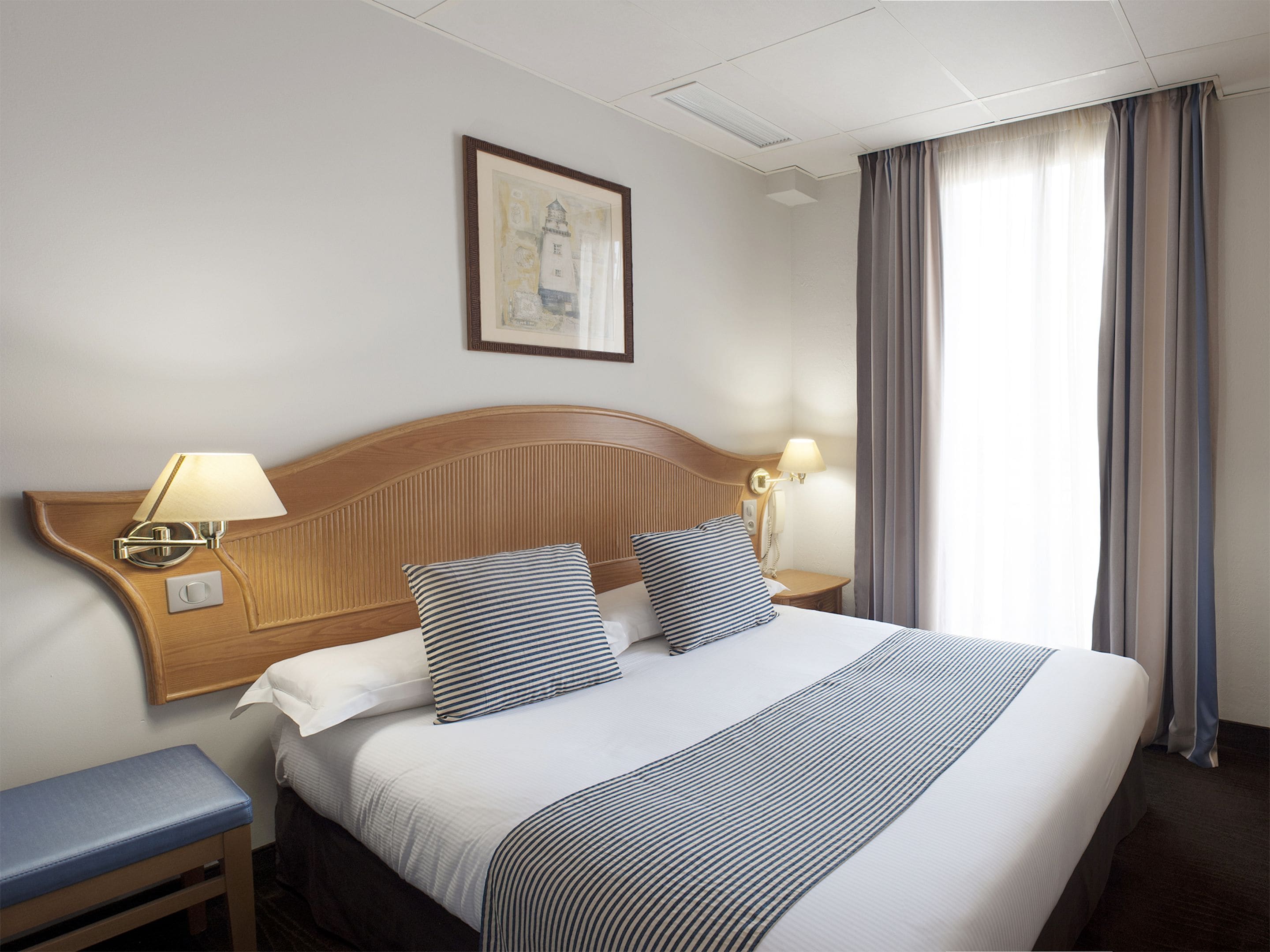 standard double or twin room | premium bedding, in-room safe, desk, blackout curtains