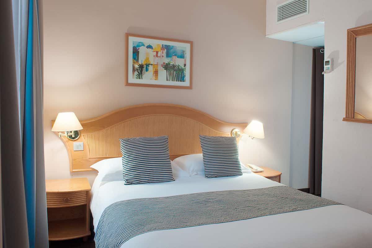 Double Room (Small) | Premium bedding, in-room safe, desk, blackout drapes