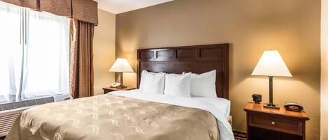 Suite, 1 King Bed, Non Smoking | 1 bedroom, desk, soundproofing, iron/ironing board