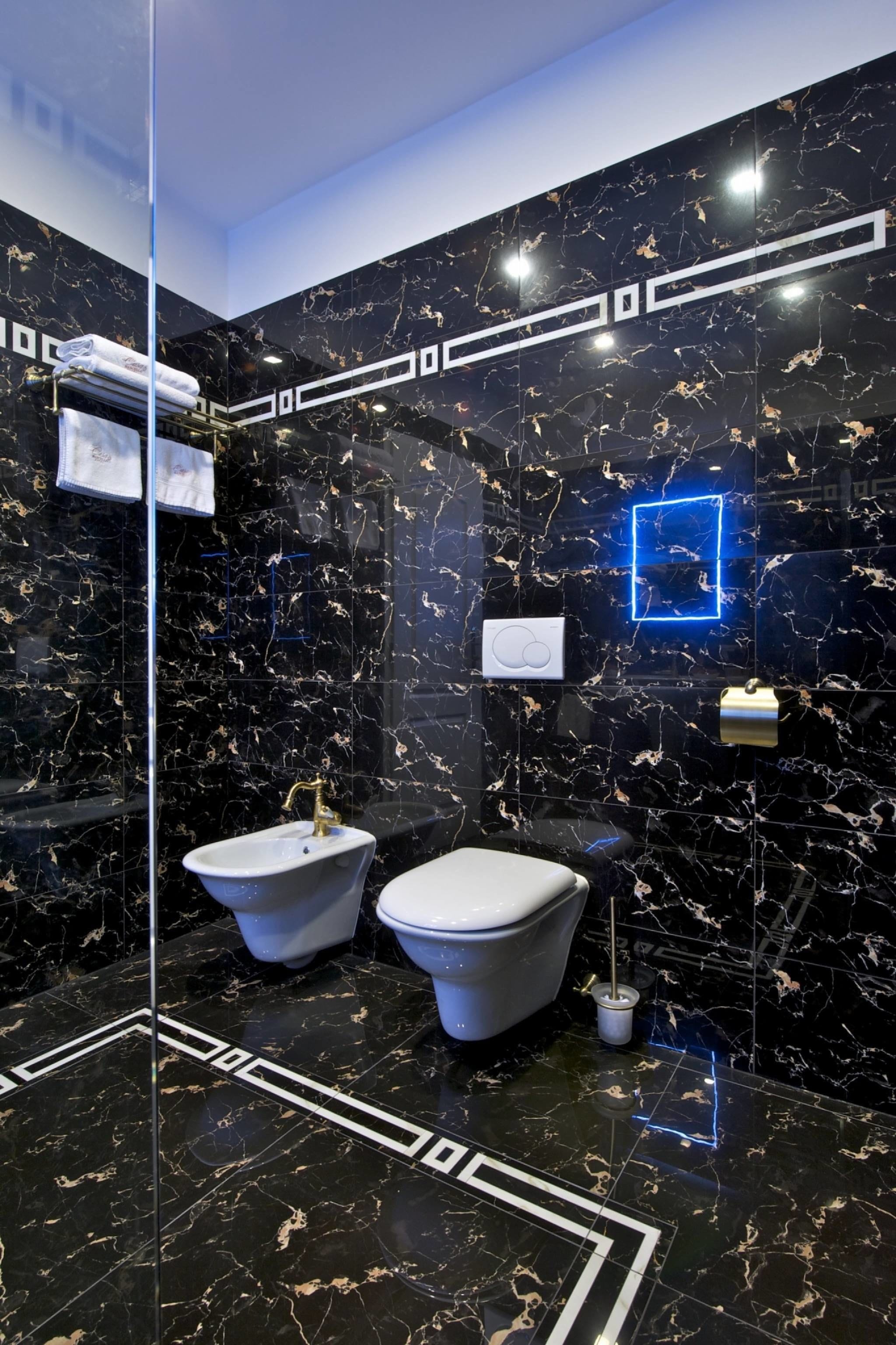 suite | bathroom amenities | free toiletries, hair dryer, bathrobes, slippers