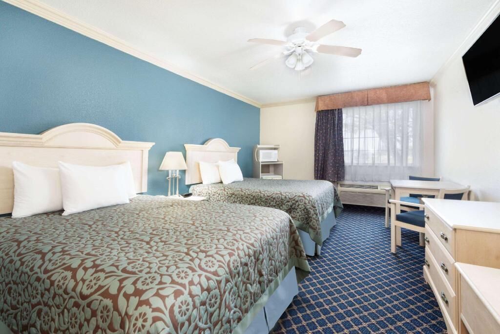 Premium bedding, pillowtop beds, desk, laptop workspace