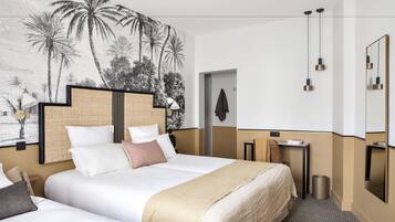 Luxe beddengoed, pillowtop-bedden, een minibar, een kluis op de kamer