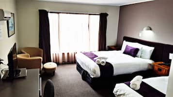 Premium bedding, pillowtop beds, desk, laptop workspace
