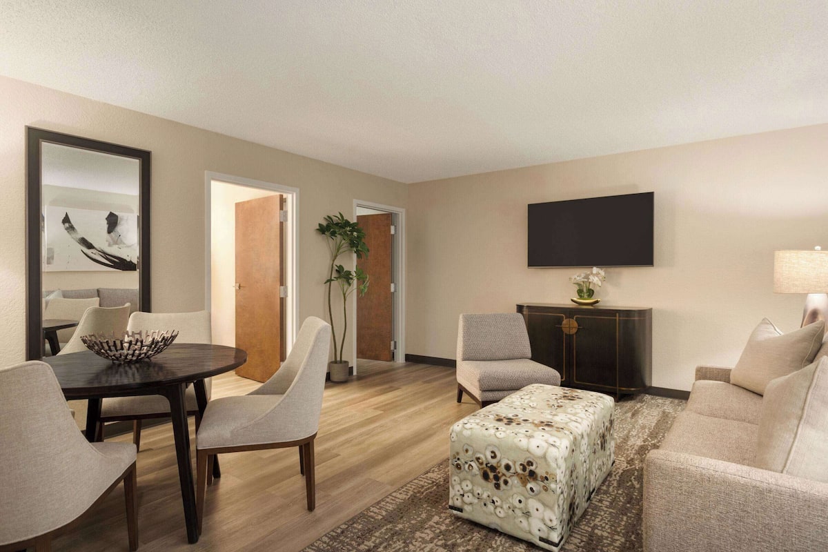 Suite, 1 King Bed with Sofa bed, Non Smoking, Pool View | Hypo-allergenic bedding, in-room safe, desk, laptop workspace