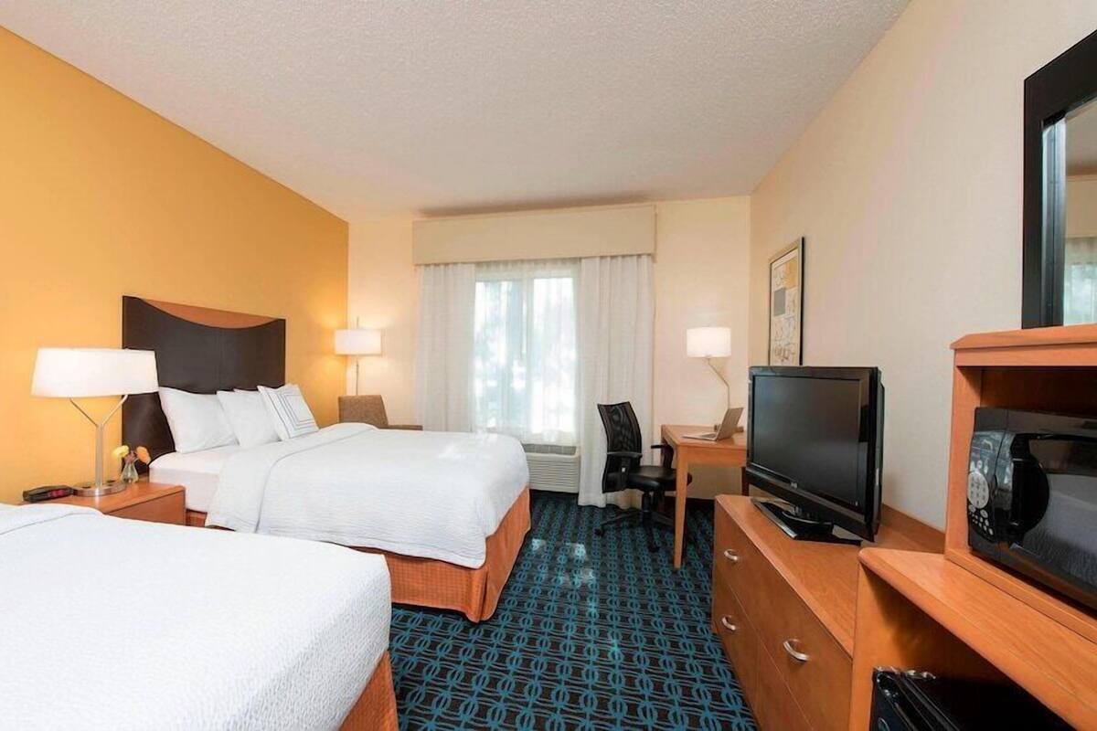 Desk, iron/ironing board, cribs (free), WiFi (free)