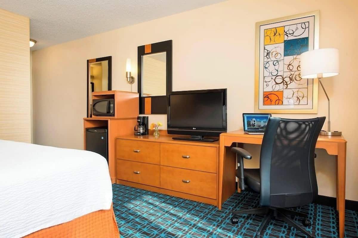 Desk, iron/ironing board, cribs (free), WiFi (free)