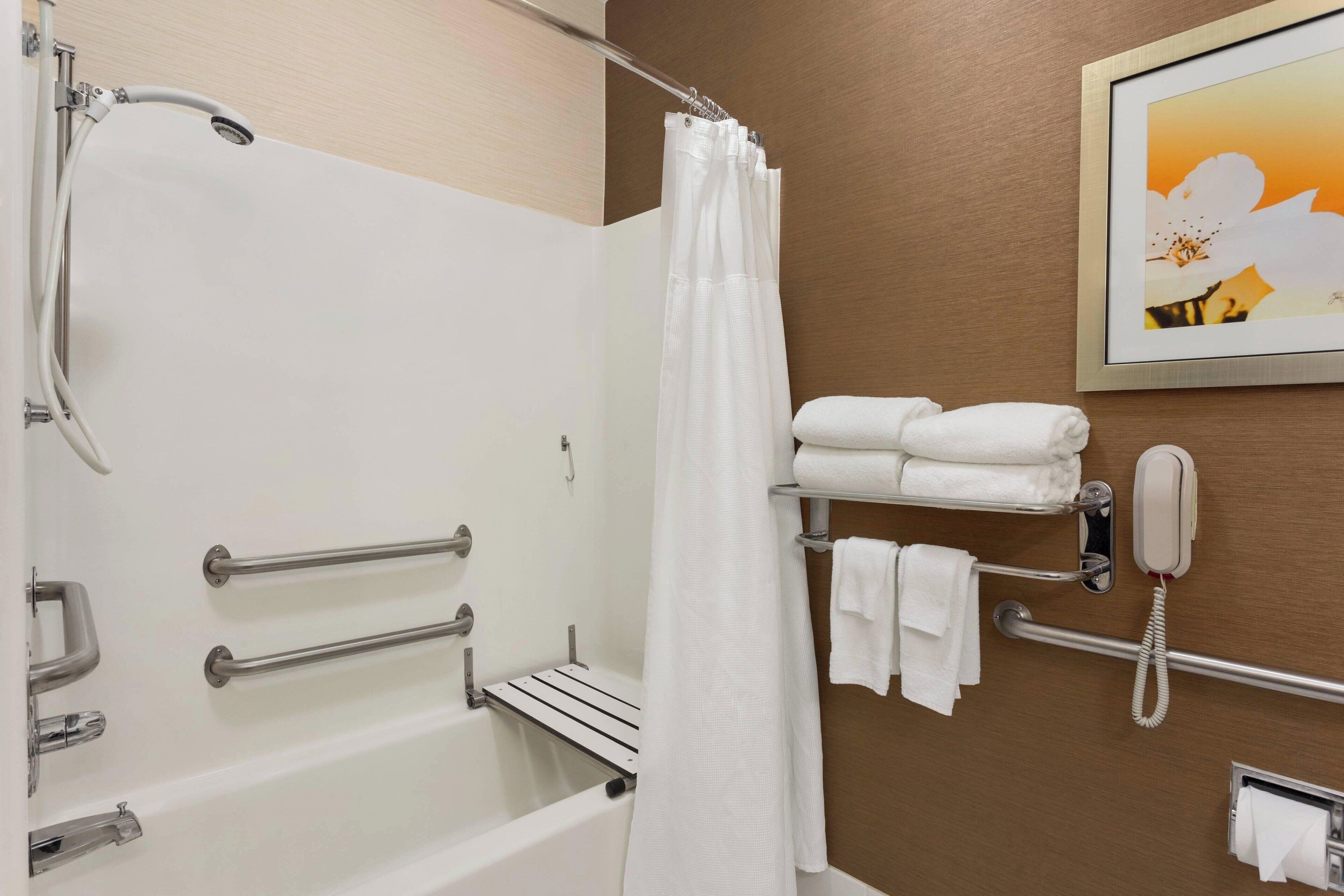 combined shower/bathtub, free toiletries, hair dryer, towels