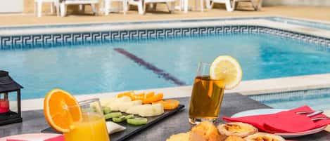 Seasonal outdoor pool, pool umbrellas, sun loungers