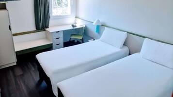 Desk, laptop workspace, blackout curtains, soundproofing
