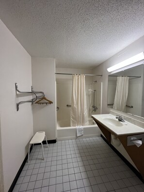 Economy Single Room, 1 King Bed, Accessible | Bathroom | Hair dryer, towels