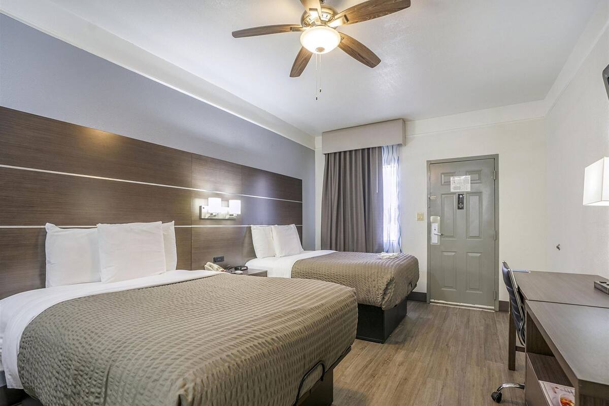 Premium bedding, blackout drapes, iron/ironing board, free WiFi