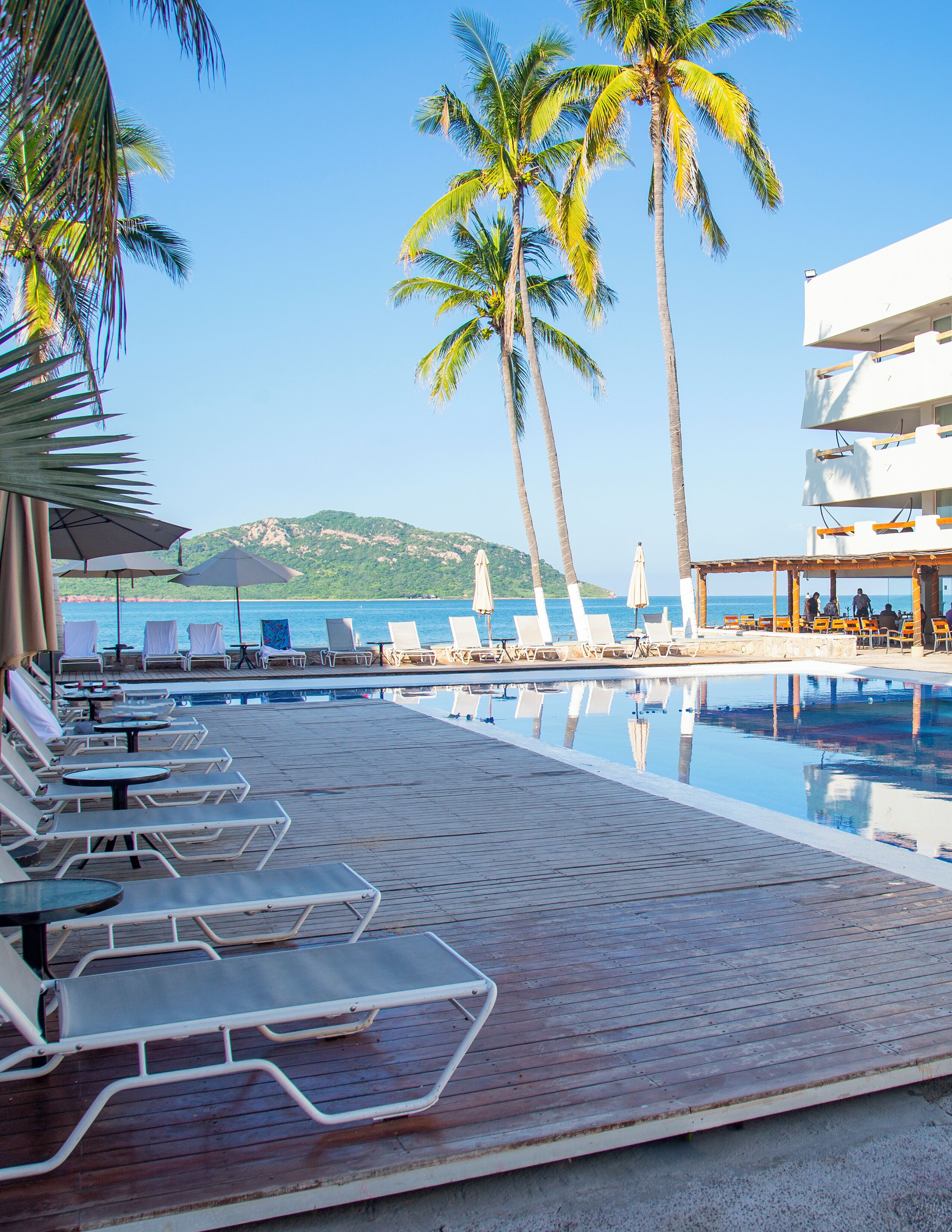 2 outdoor pools, pool umbrellas, pool loungers