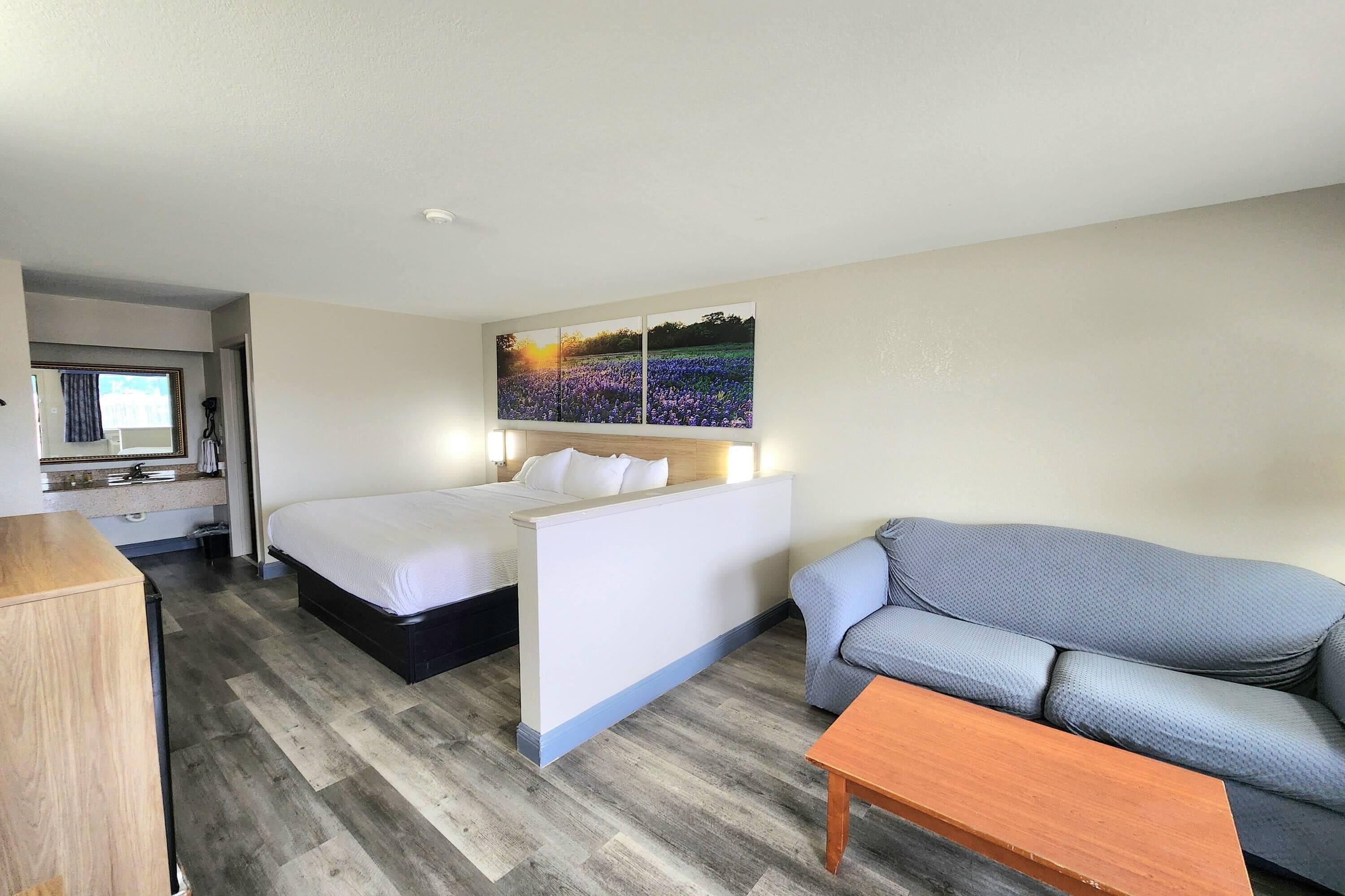 Studio Suite, 1 King Bed, Smoking | Pillowtop beds, in-room safe, desk, iron/ironing board