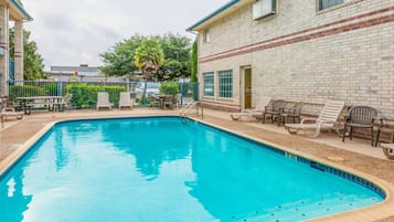 Seasonal outdoor pool, open 8:00 AM to 10 PM, pool umbrellas