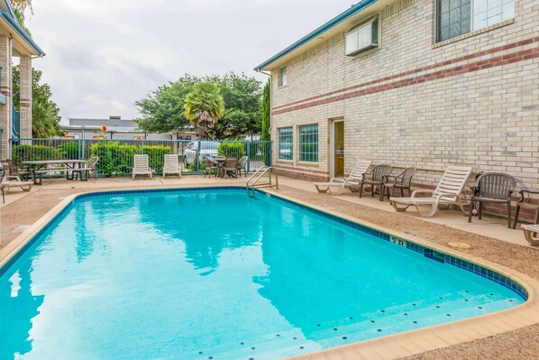Seasonal outdoor pool, open 8:00 AM to 10 PM, pool umbrellas