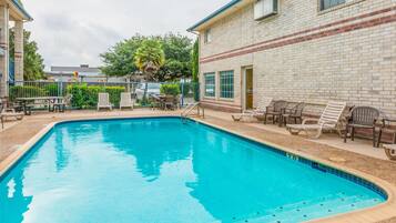 Seasonal outdoor pool, open 8:00 AM to 10 PM, pool umbrellas