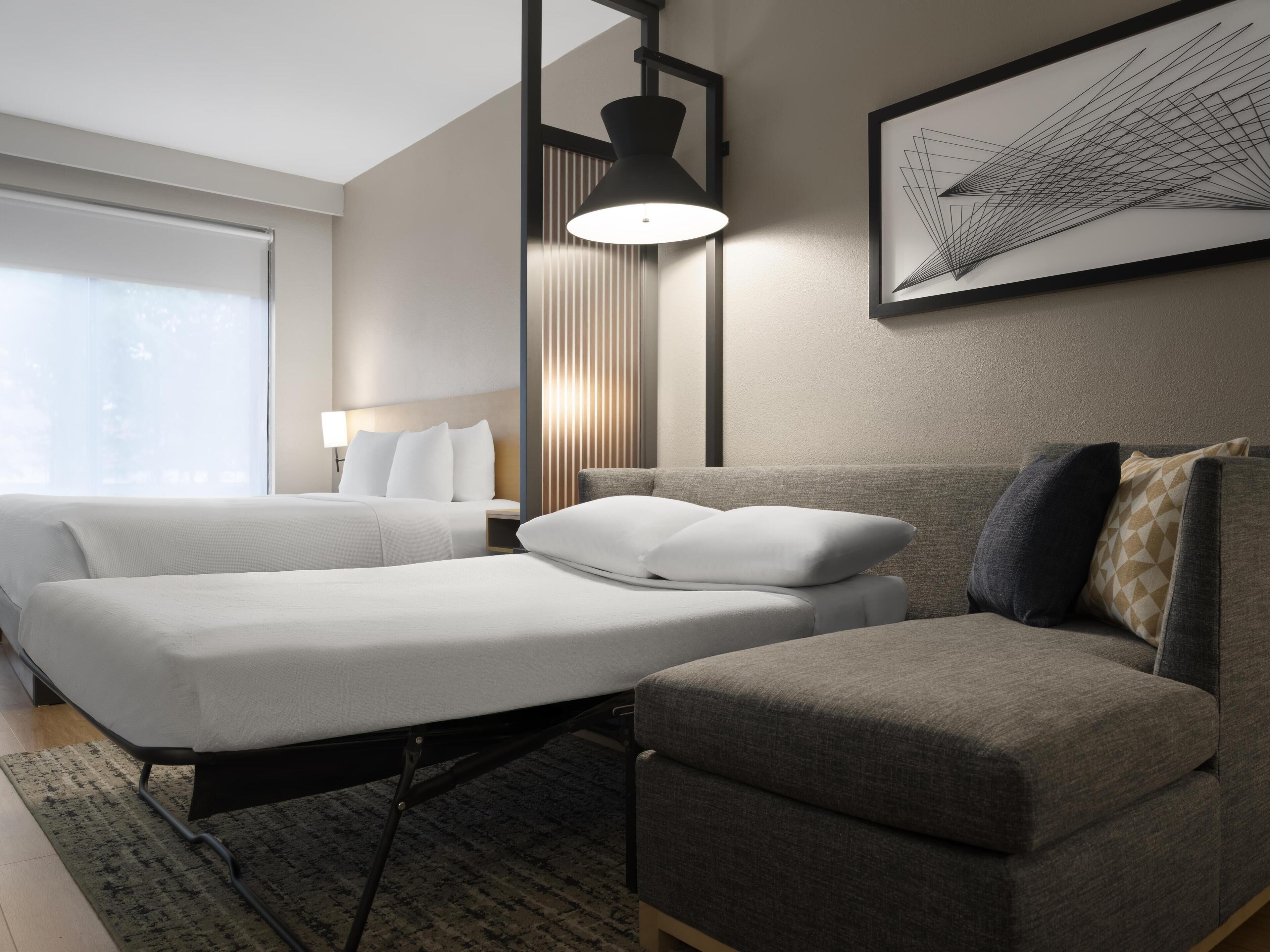 hypo-allergenic bedding, in-room safe, desk, blackout curtains