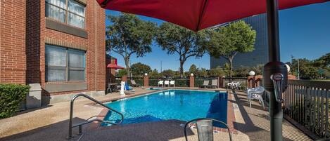 Outdoor pool, open 8:00 AM to 11:00 PM, pool loungers