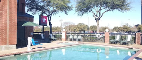 Outdoor pool, open 8:00 AM to 11:00 PM, pool loungers