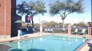 Outdoor pool, open 8:00 AM to 11:00 PM, pool loungers