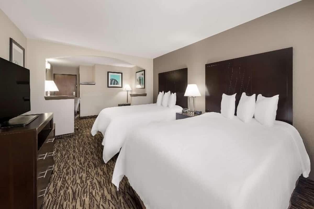 Premium bedding, desk, blackout drapes, iron/ironing board