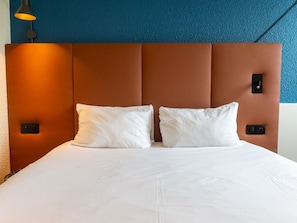 Premium bedding, pillowtop beds, desk, blackout drapes