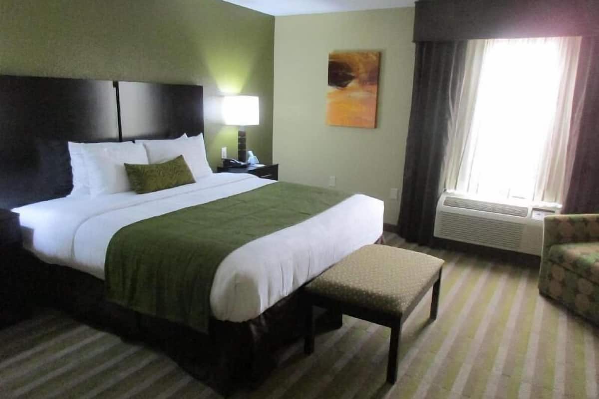 Premium bedding, desk, laptop workspace, iron/ironing board
