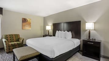Premium bedding, desk, laptop workspace, iron/ironing board
