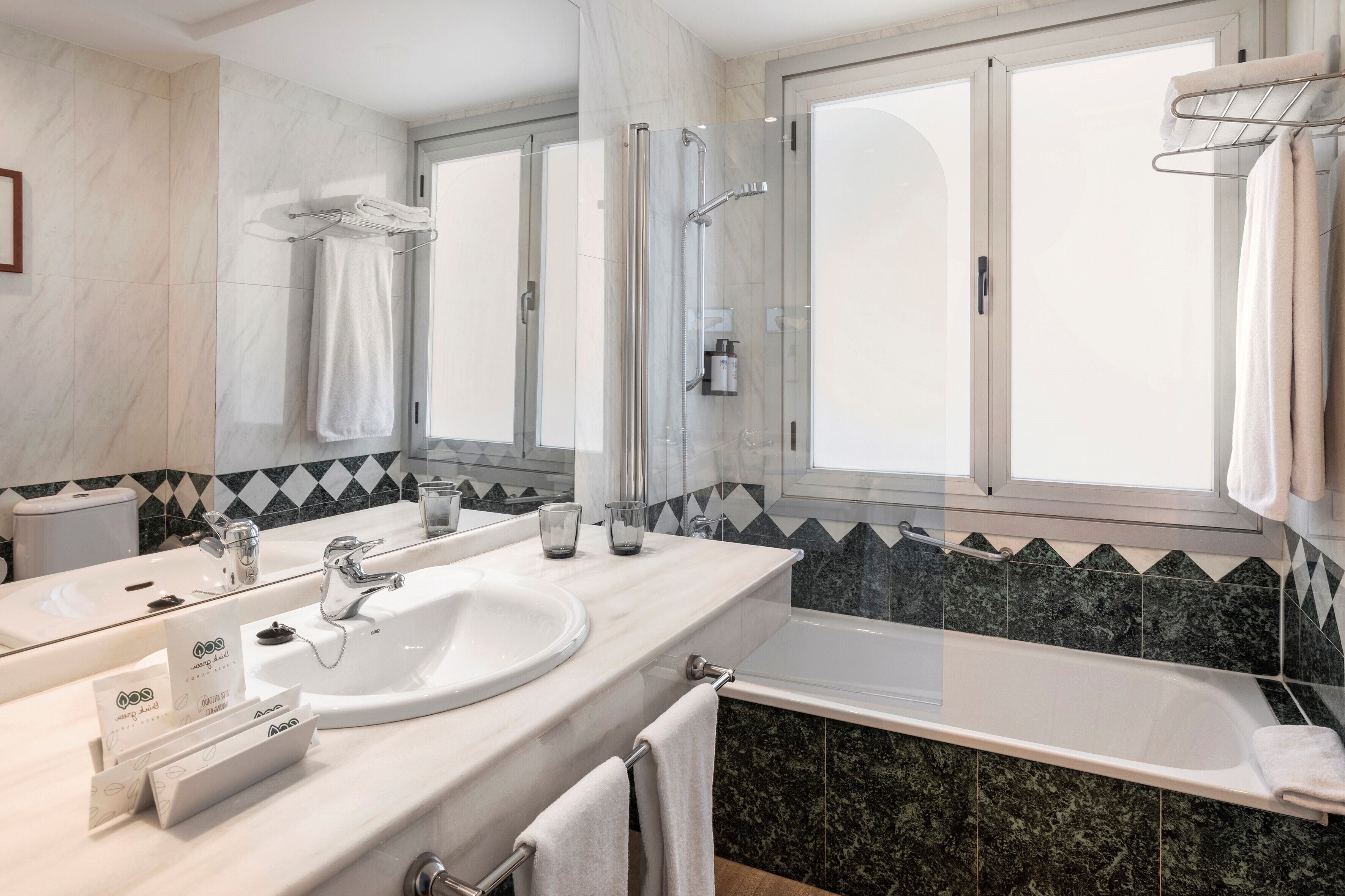 premium room | bathroom | hair dryer, towels