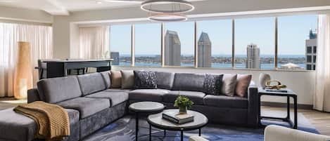 Presidential Suite, Skyline View | Living room | 55-inch TV with cable channels, pay films