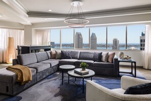 Presidential Suite, Skyline View | Living room | 55-inch TV with cable channels, pay movies
