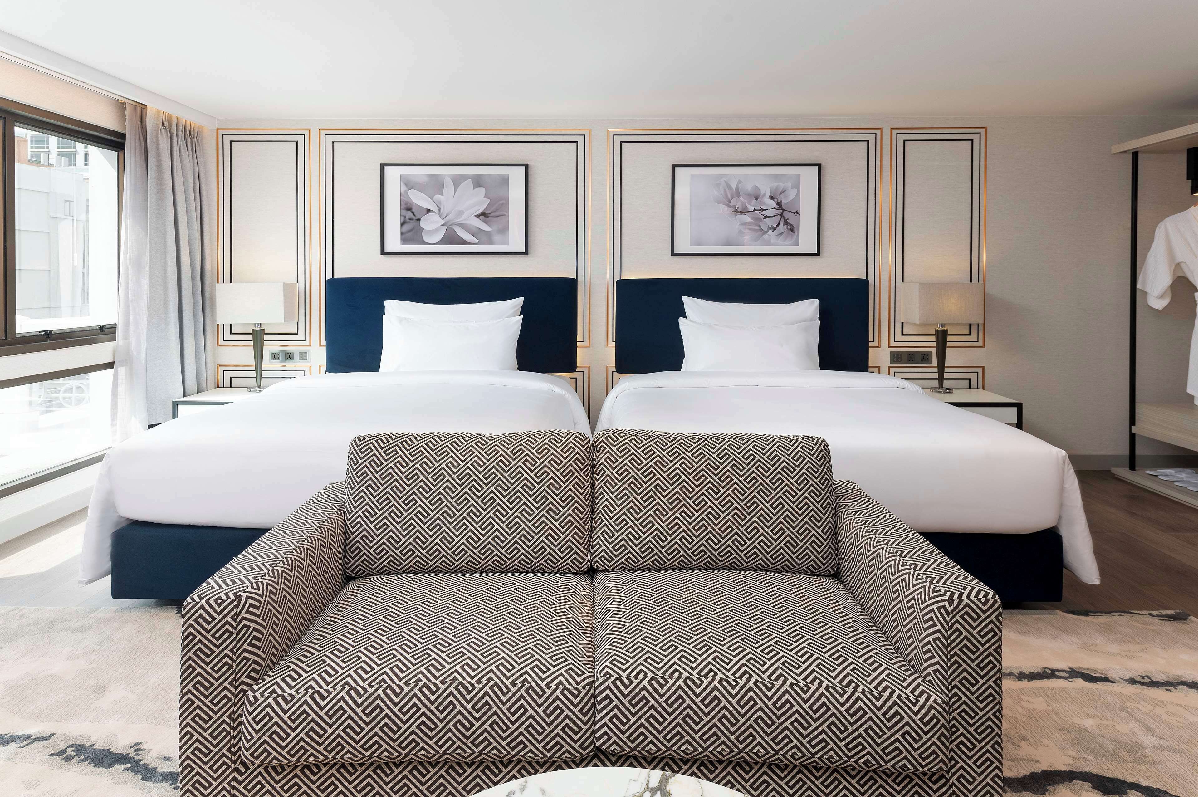 family room | in-room safe, blackout curtains, iron/ironing board