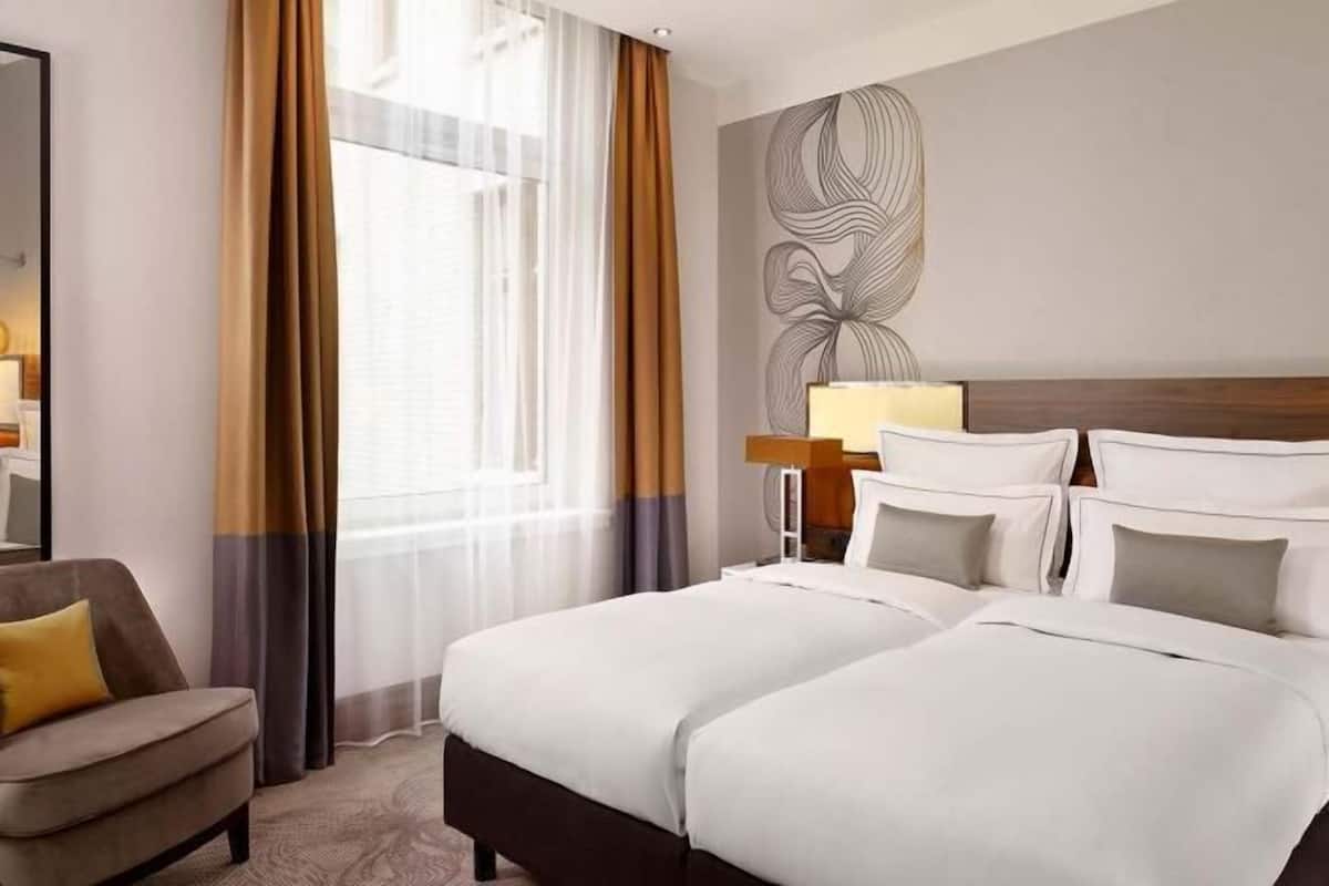 1 habitación, ropa de cama hipoalergénica y colchones Tempur-Pedic
